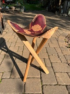 lot 11 image: Harley Davidson Pack on your Rack Collapsible Etched-Leather Top T-P Style Stool...
