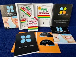 lot 66 image: Vox in a Box Spanish, Living Language French Essential Edition...