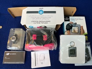 lot 67 image: Digital Key Chain Photo Album - Virtual Realty Smart Phone Headset - On Demand Heart Rate Machine...