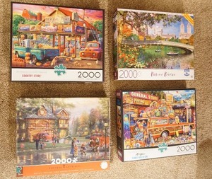lot 61 image: Hobbies Puzzles Four Boxed 2000 Piece One Setting Jigsaw Puzzles...