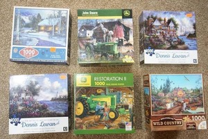 lot 63 image: Hobbies Puzzles Six Boxed 1000 Piece One-Setting Jigsaw Puzzles...