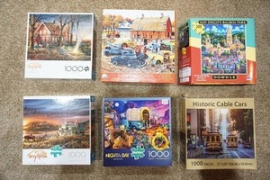 lot 65 image: Hobbies Puzzles Six Boxed 1000 Piece One-Setting Jigsaw Puzzles...
