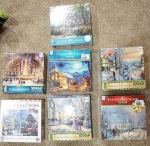 lot 69 image: Hobbies Puzzles Seven Boxed 1000 Piece One-Setting Jigsaw Puzzles...