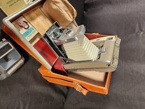 lot 83 image: Vintage Polaroid Land Camera Model 150 and The 800 in Hard Case with Accessories