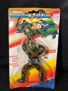 lot 117 image: Vintage Wind-Up Crawling Soldier New in Packaging