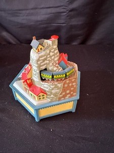 lot 183 image: 1981 Enesco Alpine Village Music Box Its a Small World