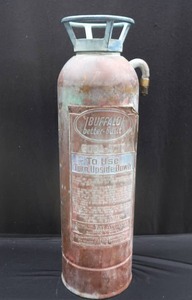 lot 11 image: VINTAGE BRASS BUFFALO FIRE APPLIANCE