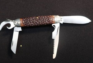lot 45 image: REMINGTONMADE IN THE USAKNIFEMULTI TOOL