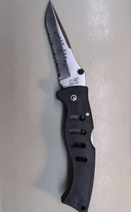 lot 51 image: GREEN BERET MADE IN THE USA FOLDABLE KNIFE
