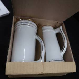 lot 91 image: NEW PORCELAIN BEER STEINS GOLD TRIM