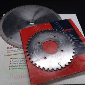 lot 142 image: INDUSTRIAL SAW BLADE PAIR