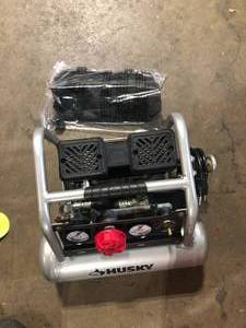 Husky 1 Gal. Portable Electric-Powered Silent Air Compressor  Customer Returns See Pictures