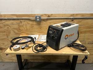 lot 37 image: HOBART Handler 210MVP Flux-CoreMIG Welder with Multi-Voltage Plug  Transformer, 115V230V, 25210 Amp Output, Model# 500553