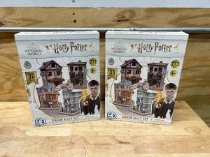 lot 106 image: HARRY POTTER Lot of 2- Cityscape 3D Paper Puzzles (Diagon Alley)