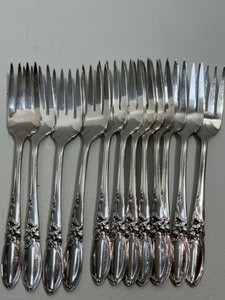 lot 66 image: Vintage 50s MCM White Orchid Salad Forks 12 Count Stainless by Community