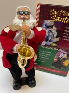 lot 136 image: Vintage Gemmy Animated Sax Playing Santa Claus Jazz Music
