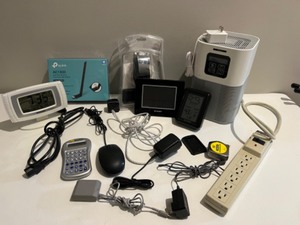 lot 188 image: Chargers, Odd Cords for charging Apple Products, Air Purifier, Battery Alarm Clock, Auto Pilot,TP-Link & More