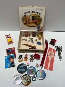 lot 220 image: Cigar Box with Junk Drawer Items, Pinback Buttons, Game Pieces and More