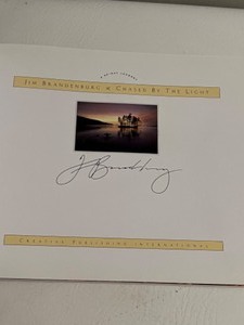 lot 355 image: Signed Copy of CHASED BY THE LIGHT by Jim Brandenburg - A 90-Day Journey Book