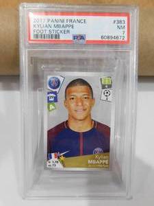 lot 275 image: PSA 7 2017 Panini France Sticker Kylian Mbappe Rookie #383 RARE