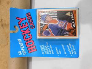 lot 282 image: (50) Different Hockey Cards Vintage New In Package with Wayne Gretzky All-Star Card On Top