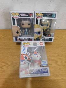 lot 299 image: (3) Funko Pop - Eivor #778, Dom Toretto #1078 & Tony The Tiger #121 New in Box