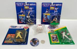 lot 85 image: Misc. Starting Lineup Sports Figures Including Baseball,Football & Twins Baseball With Printed Signatures