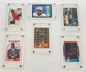 lot 139 image: Misc. Sports Trading Cards In Hard Plastic Holders Including MICHAEL JORDAN White Sox Rookie, Warren Moon Rookie Card & More