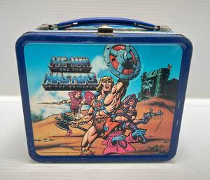 lot 191 image: 1984 (He-Man Masters Of The Universe) Metal Embossed Lunch Box
