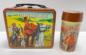 lot 199 image: 1972 Vintage (Gunsmoke) Embossed Metal Lunchbox & Thermos (Original Label On Side)