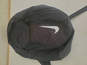 lot 43 image: Black Niki Back Pack-Body-100% Polyester--Lining -100% Polyester -Made In Indonesia-