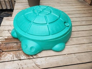 lot 74 image: Outdoor Kids Toys Turquoise Frog Covered Sandbox