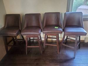 lot 77 image: Four Matching Leather Swivel Bar Stools With Backs
