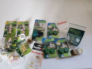 lot 87 image: Lot Filled With Garden Hose Menders ETC