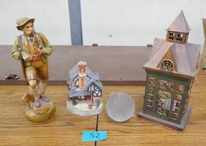 lot 52 image: Candle house, wood carved guy with dog, glass globe and house