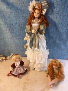 lot 90 image: 3 Porcelain Dolls