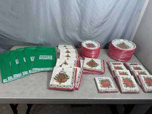 Large Assortment of Christmas Themed Paper Plates, table cloths, and Napkins
