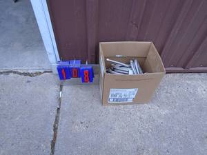lot 108 image: Box of 10 stainless water hoses. As shown.