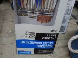 lot 63 image: Adjustable Closet Organizer Kit, vinyl wall base and more flooring products