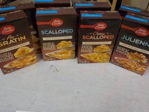 lot 94 image: 8 Boxes Betty Crocker Potatoes Meals - 2 each Julienne, Cheesy Scalloped, Scalloped, and Au Gratin best date 07262023