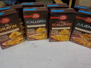 lot 95 image: 8 Boxes Betty Crocker Potatoes Meals - 2 each Julienne, Cheesy Scalloped, Scalloped, and Au Gratin best date 07262023