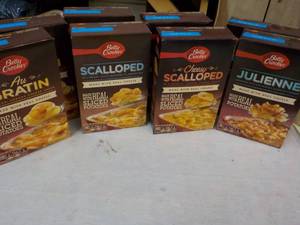 lot 97 image: 8 Boxes Betty Crocker Potatoes Meals - 2 each Julienne, Cheesy Scalloped, Scalloped, and Au Gratin best date 07262023