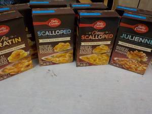lot 101 image: 8 Boxes Betty Crocker Potatoes Meals - 2 each Julienne, Cheesy Scalloped, Scalloped, and Au Gratin best date 07262023