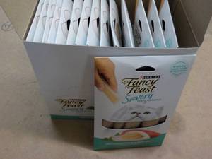 lot 154 image: 15 ct Purina Fancy Feast Savory Cat Treats Natural Tuna in a Demi Glaze best date 082023 Retail $3 each