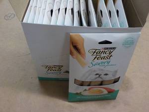 lot 156 image: 15 ct Purina Fancy Feast Savory Cat Treats Natural Tuna in a Demi Glaze best date 082023 Retail $3 each