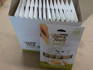 lot 162 image: 15 ct Purina Fancy Feast Savory Cat Treats Natural Chicken in a Demi Glaze best date 082023 Retail $3 each