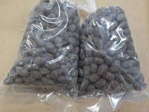 lot 273 image: 2 - 2 lb. bags Chocolate Covered Almonds