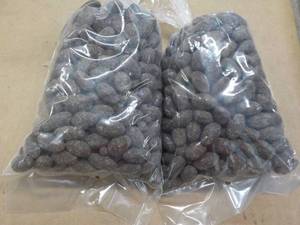 lot 274 image: 2 - 2 lb. bags Chocolate Covered Almonds