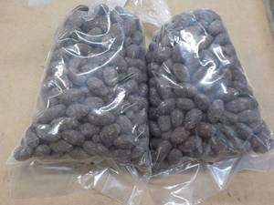 lot 279 image: 2 - 2 lb. bags Chocolate Covered Almonds