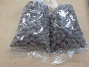 lot 280 image: 2 - 2 lb. bags Chocolate Covered Almonds